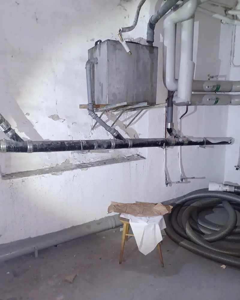 Fettavskiljare monterad på vägg